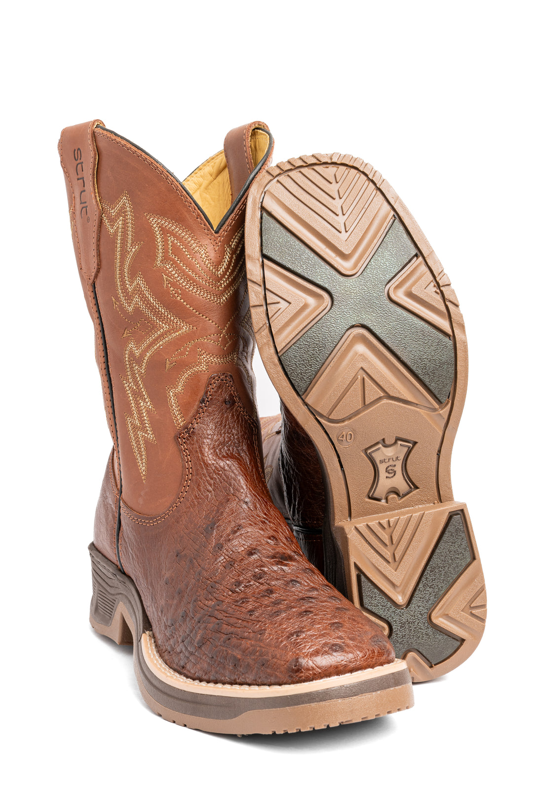 Textura folicular do couro de avestruz caramelo da bota masculina Strut