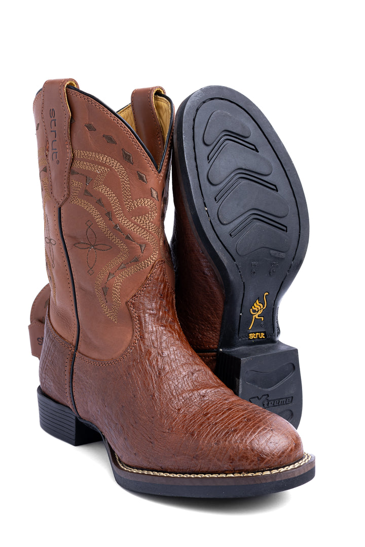 Solado de borracha antiderrapante da bota masculina Strut em couro de avestruz caramelo